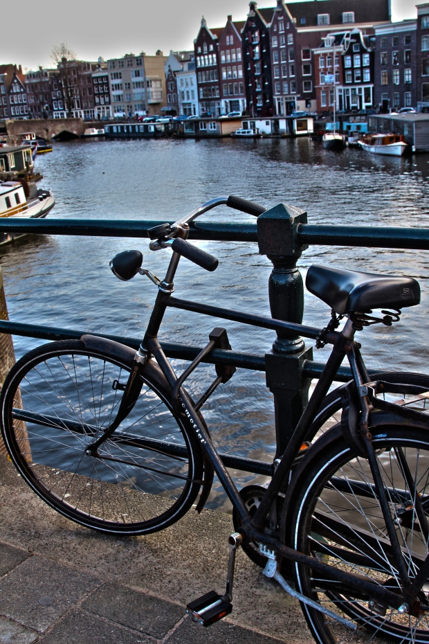 A bike along a canal in Amsterdam. 